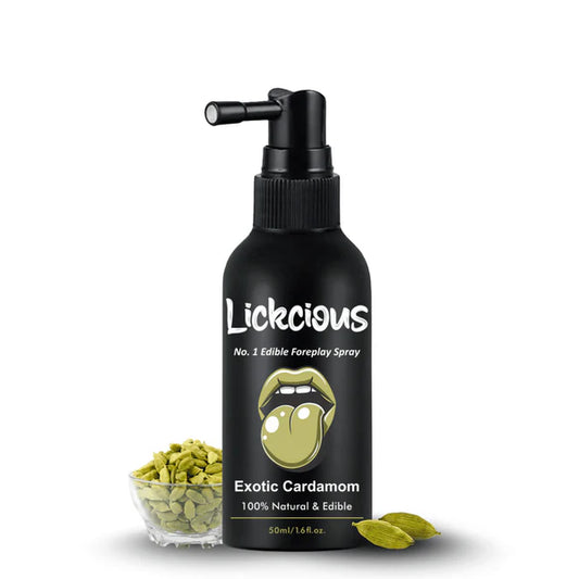 Black spray bottle labeled 'Lickecious' with cardamom spray and leaves on a white background